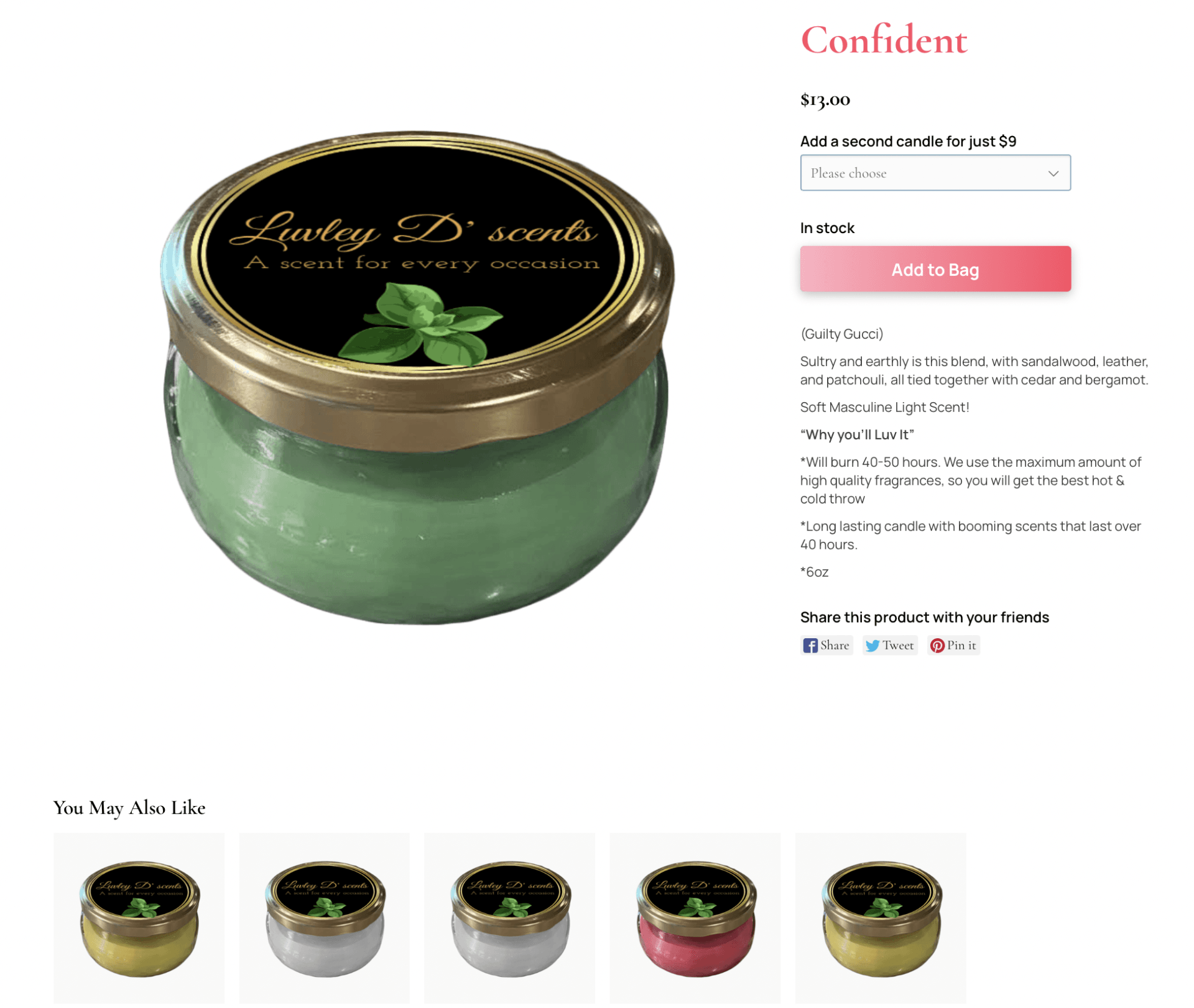 A green candle with a gold lid is on a website.