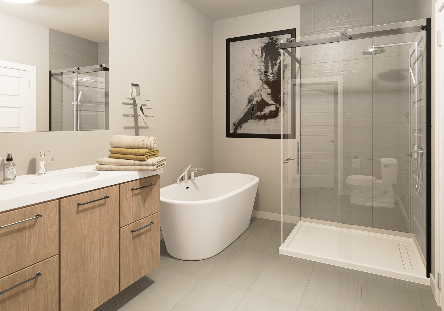 Une salle de bain avec baignoire, lavabo, WC et douche.