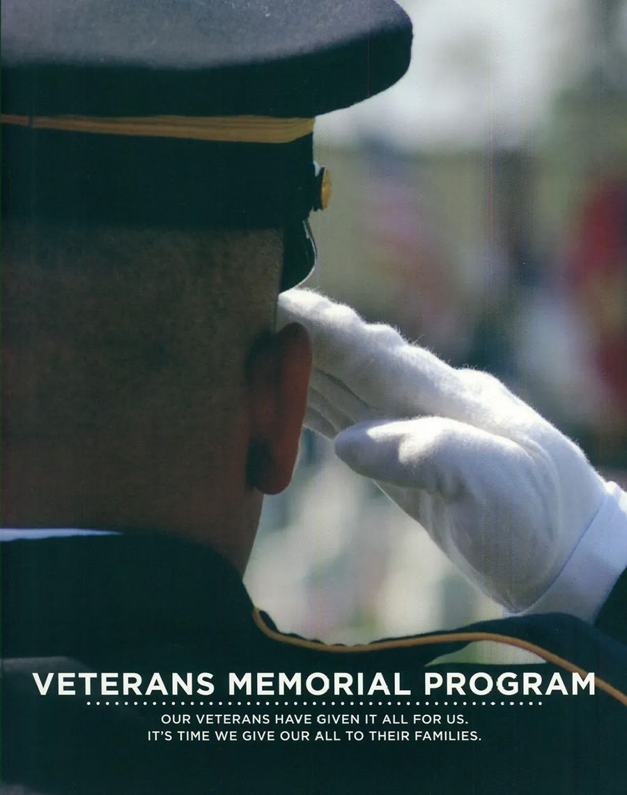 A poster for the veterans memorial program shows a man saluting