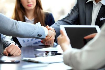 Team of professionals meeting the customer