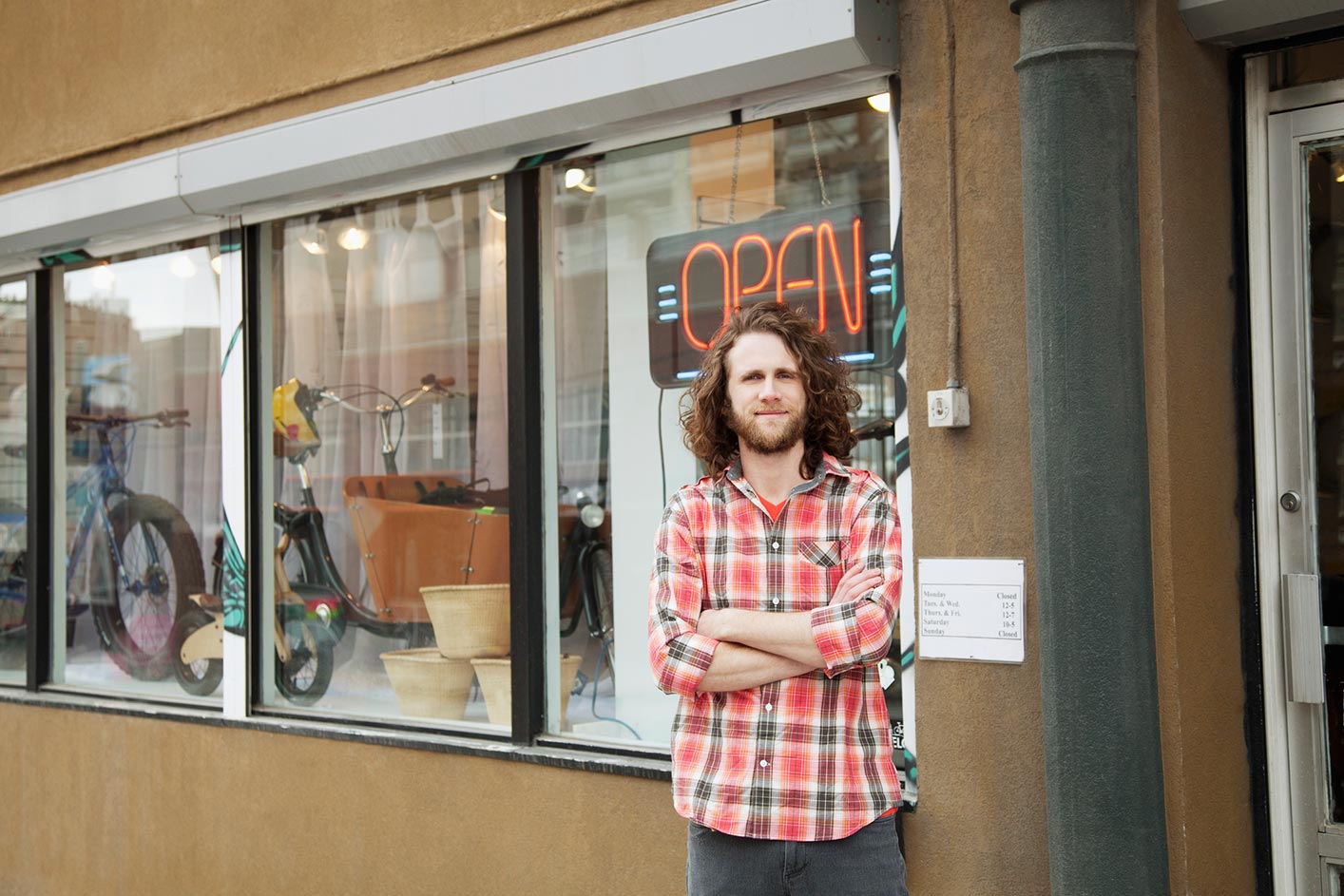 Glass Repair — Man Standing Beside His Store in Yorba Linda, CA