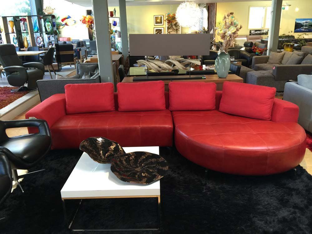 red leather couch in furniture showroom