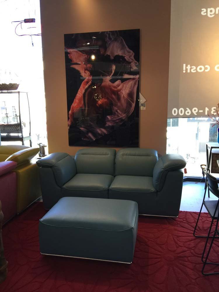 dusty blue leather love seat and ottoman