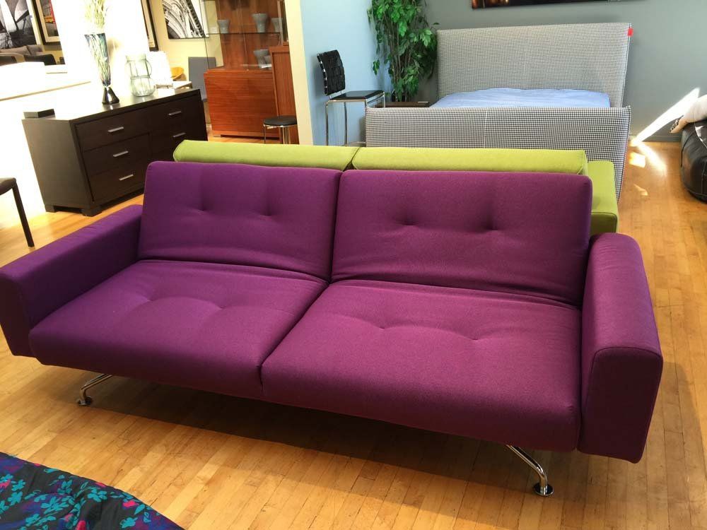 fuchsia colored couch