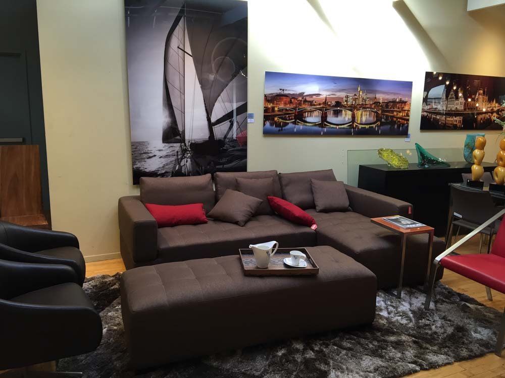 brown sectional and ottoman