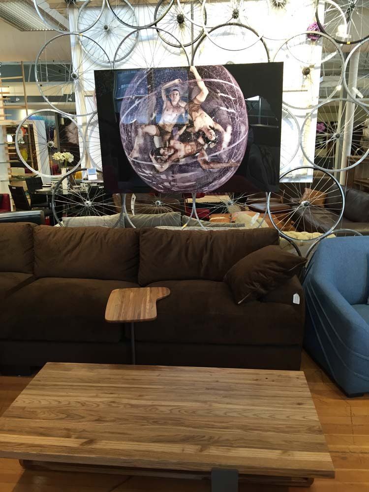 brown microfiber couch with wooden coffee table