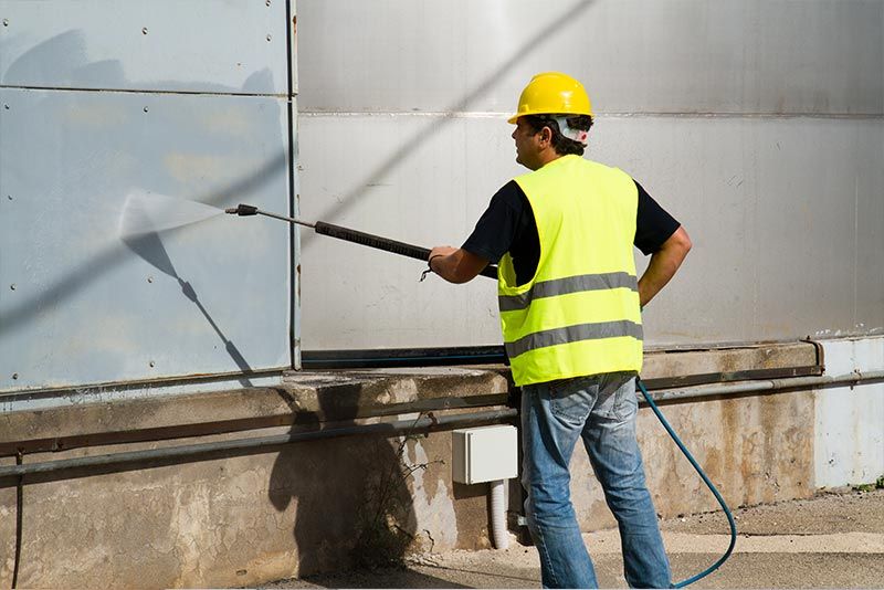 Tubs — Man Cleaning The Wall in Church Road