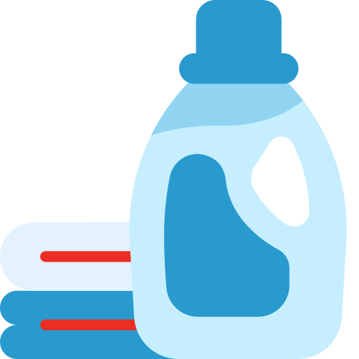 A bottle of laundry detergent is next to a pile of towels.