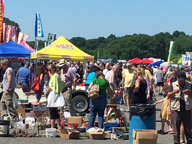 Flea Market Vendors — People Selecting Products from the Yard Sale in Stormville, NY