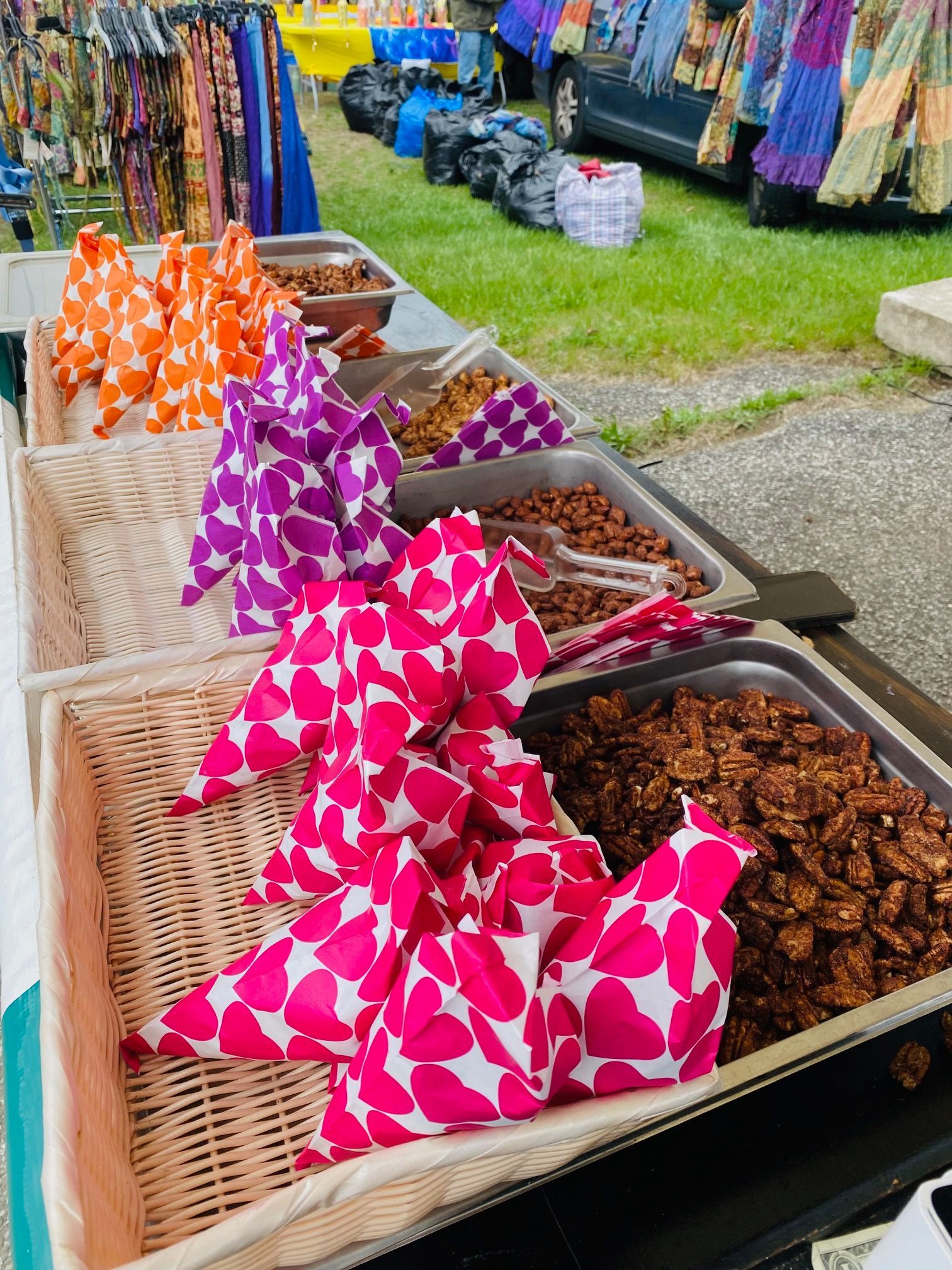 A table topped with baskets filled with different types of food.