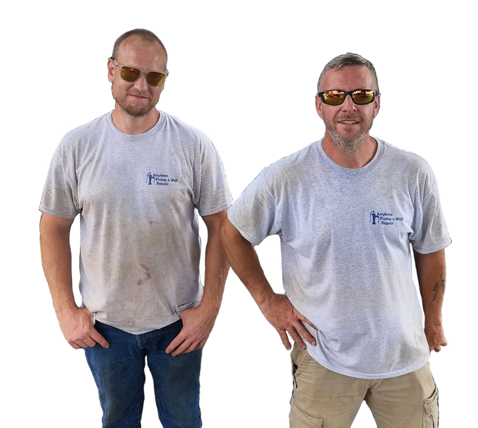 two men wearing sunglasses and dirty shirts are standing next to each other .