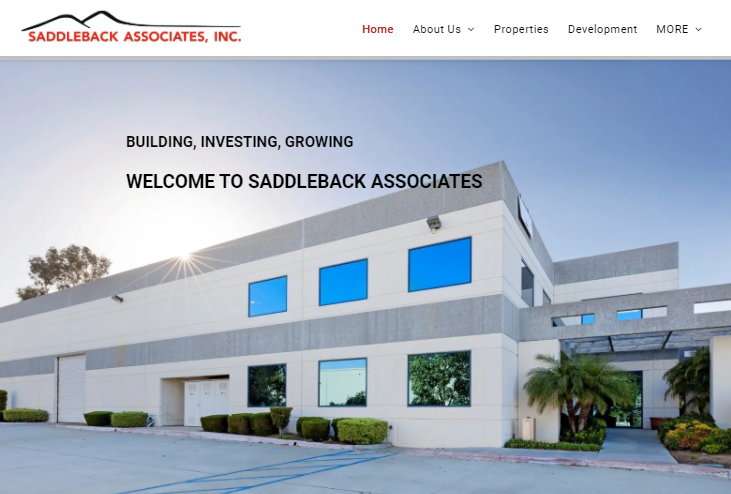 A website for saddleback associates shows a large white building with blue windows