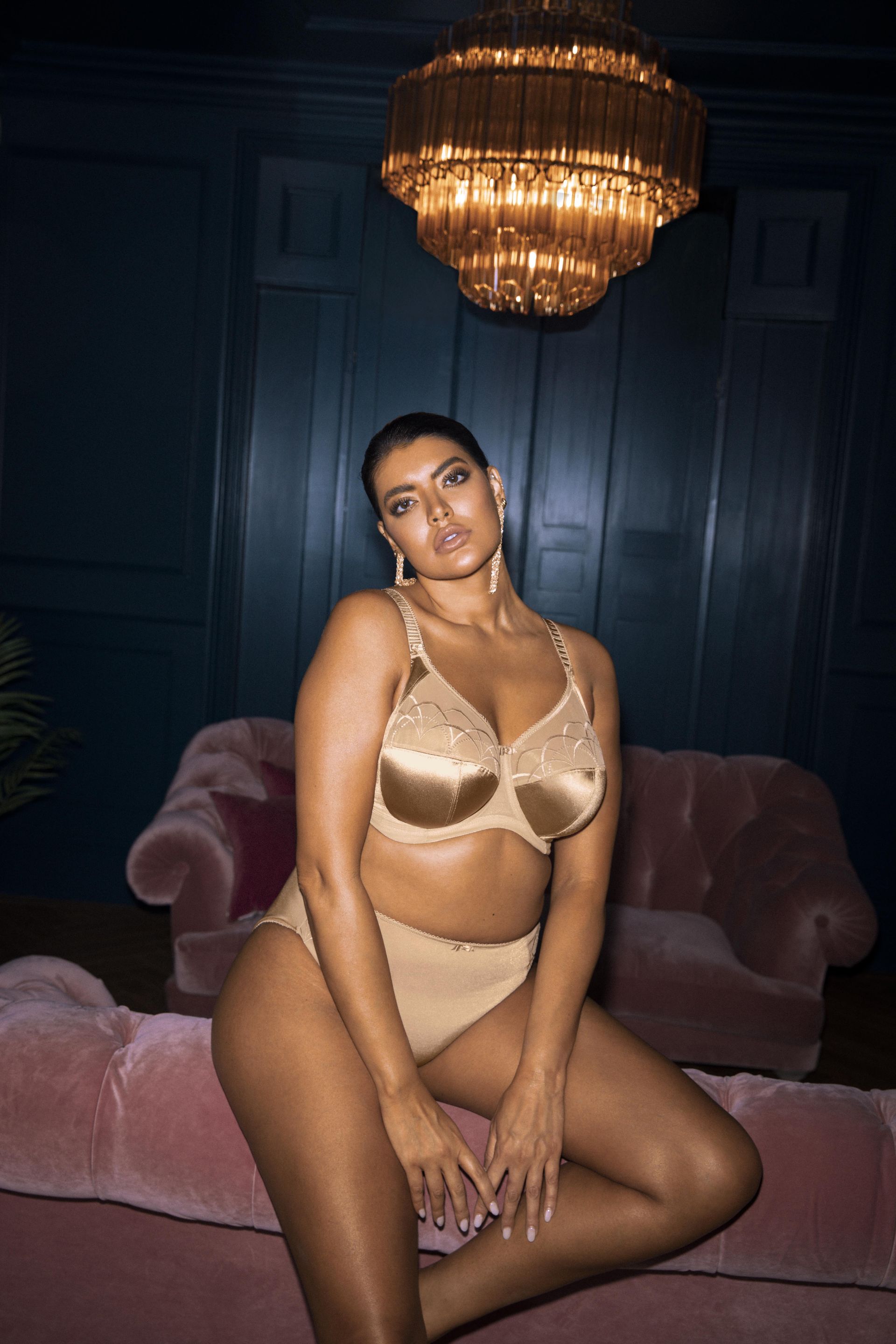 Woman Sitting On Velvet Lounge — Women’s Clothing Store in Kiama