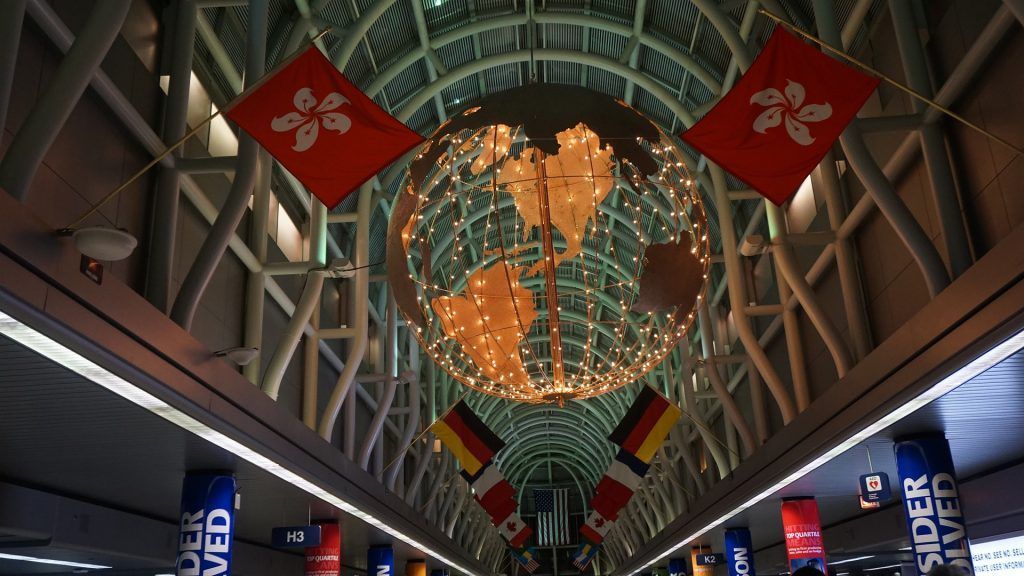 a ceiling with flags and a sign that says spider med