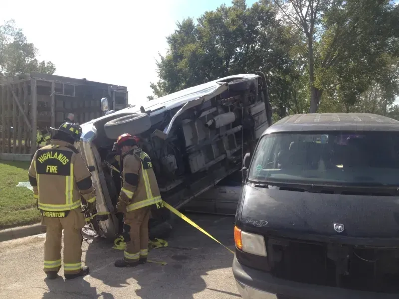 A group of firefighters with oakland fire on their backs