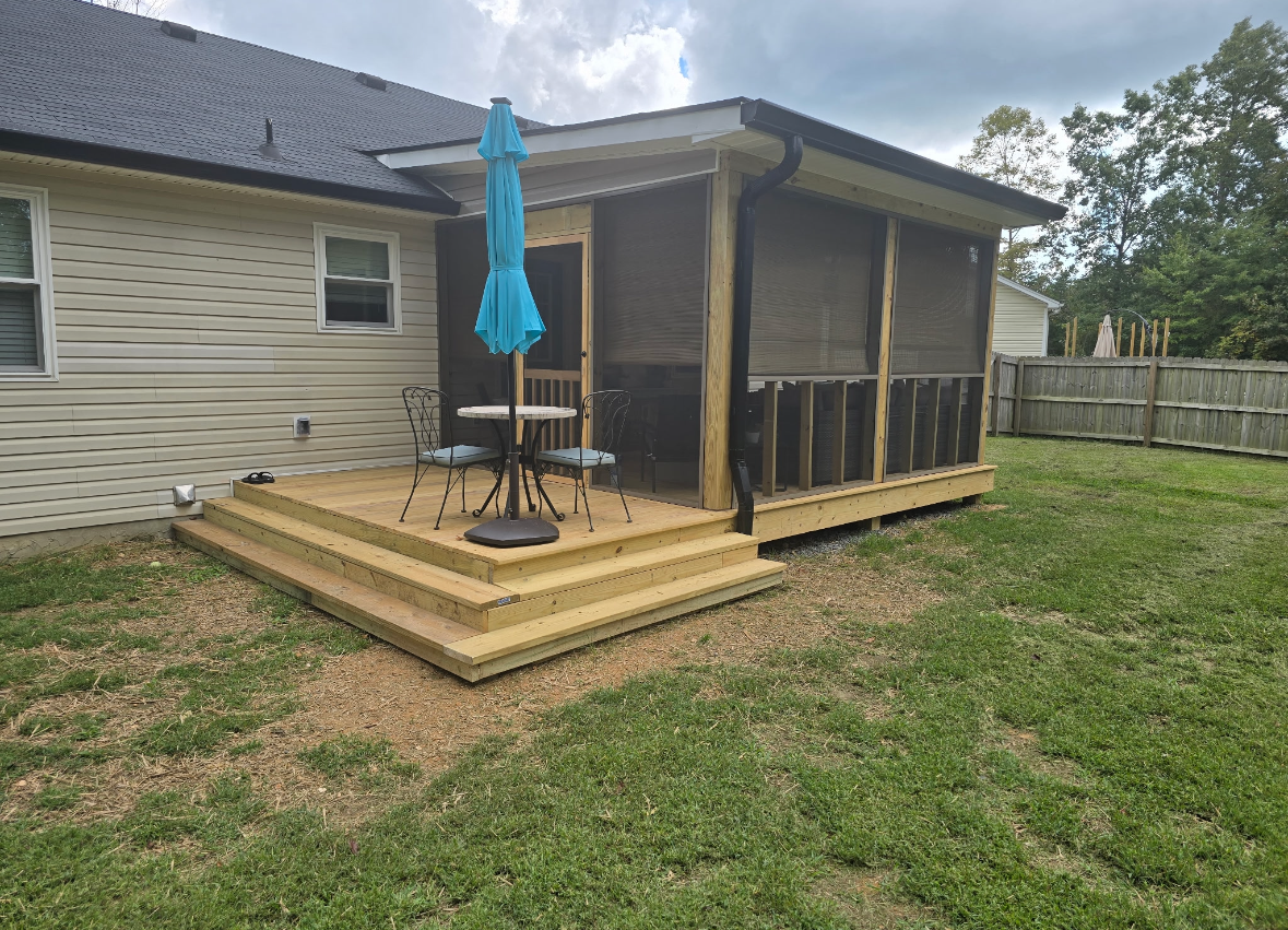 A white house with a swimming pool in the backyard
