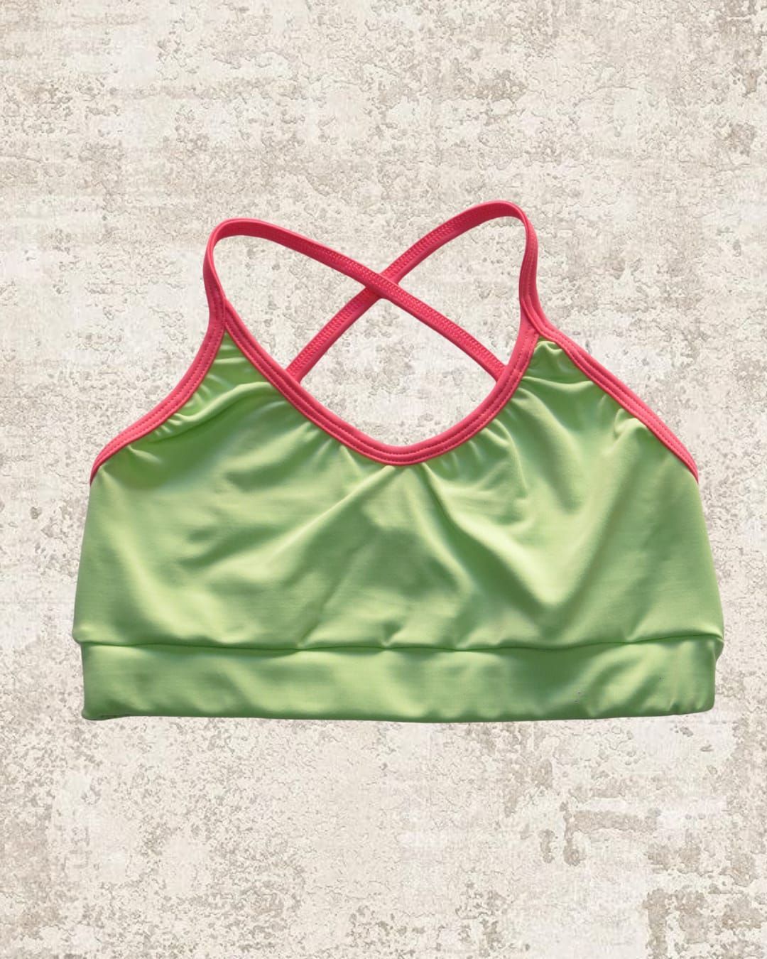 TOP CRUZADO ATRÁS VERDE PASTEL Y FUCCIA COMBINADO