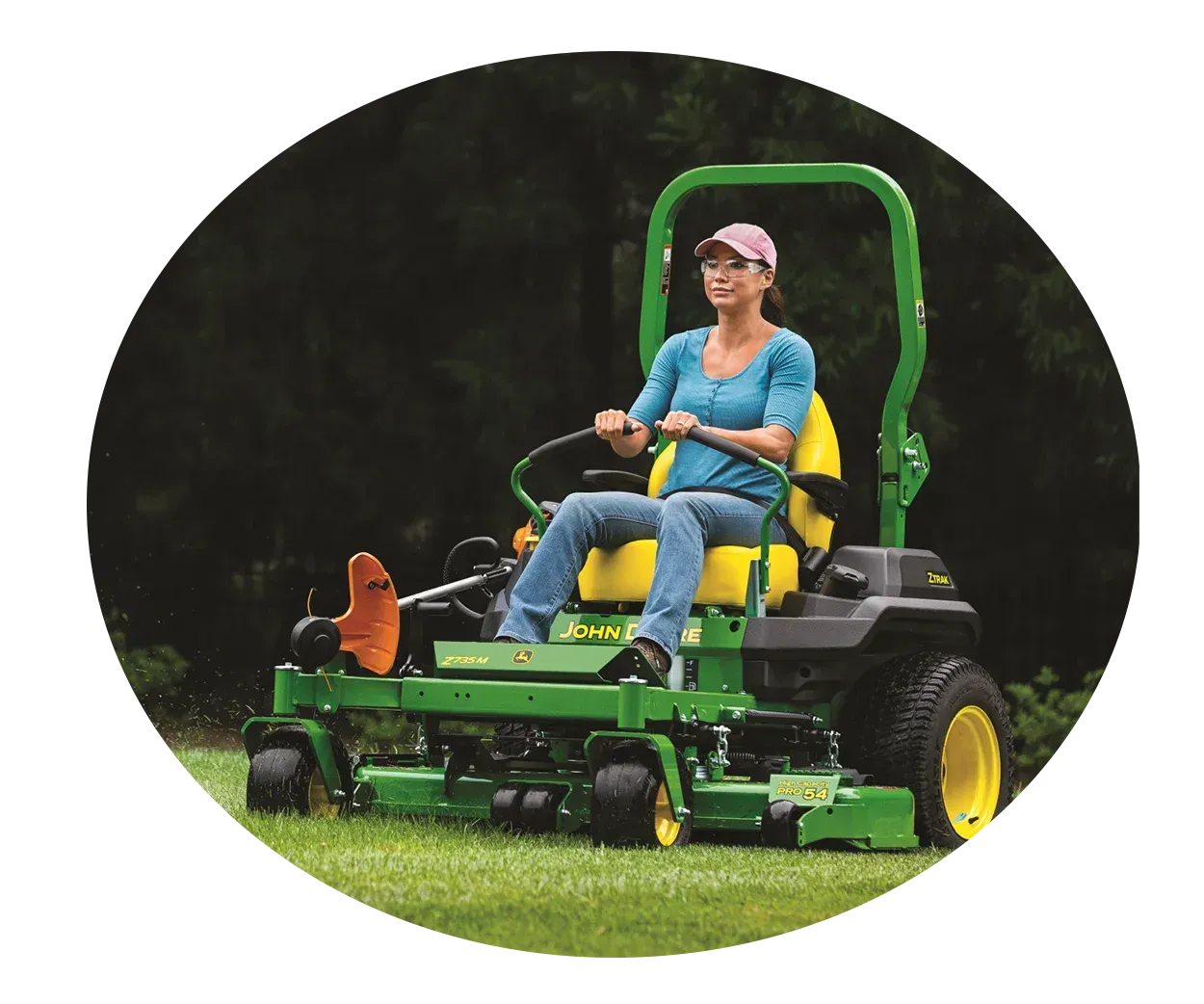Man driving zero-turn mower