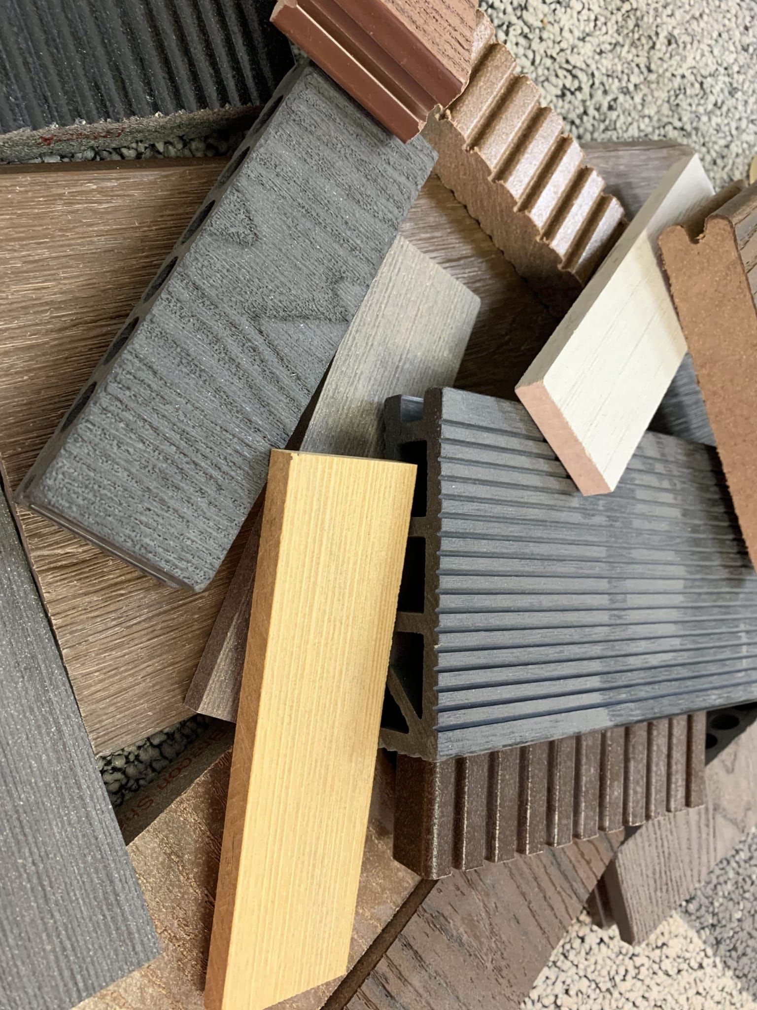 A pile of different types of wooden blocks on a table.