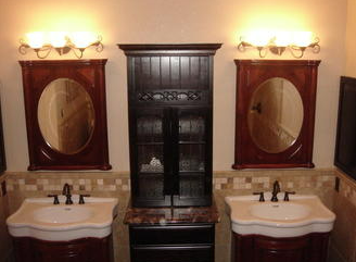 A bathroom with two sinks and two mirrors