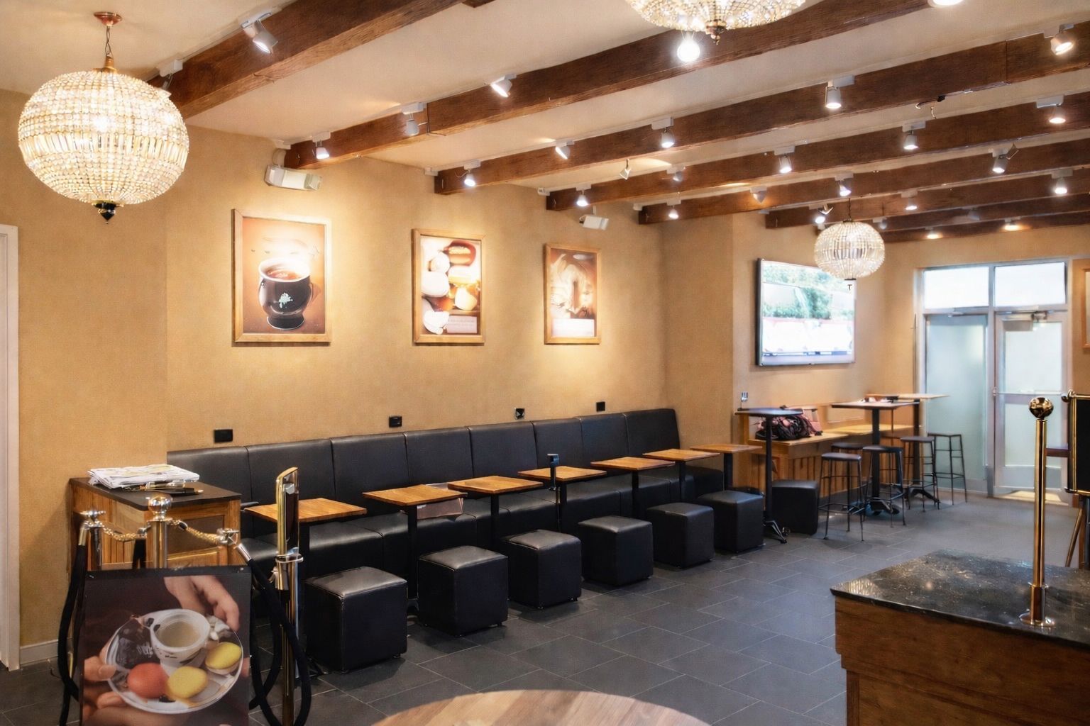 A restaurant with tables and a sign that says ' a ' on it