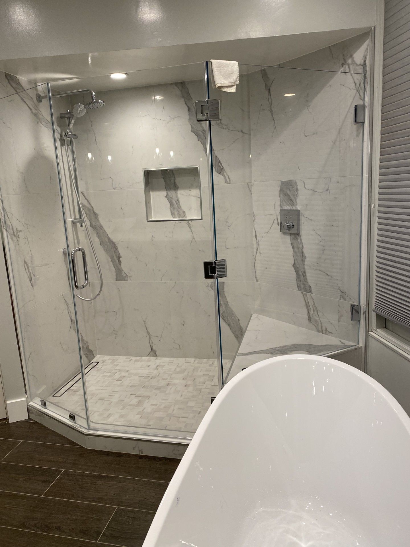 A kitchen with stainless steel appliances and granite counter tops