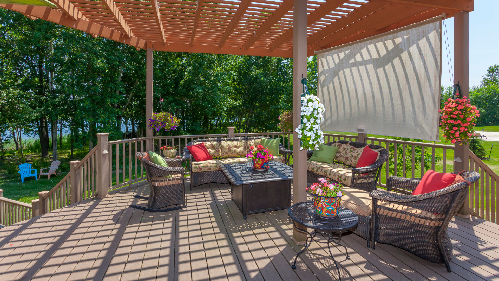 A kitchen with white cabinets , stainless steel appliances , and granite counter tops.