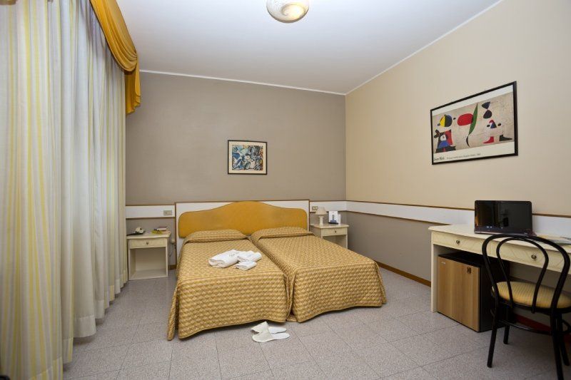 Camera doppia letti singoli