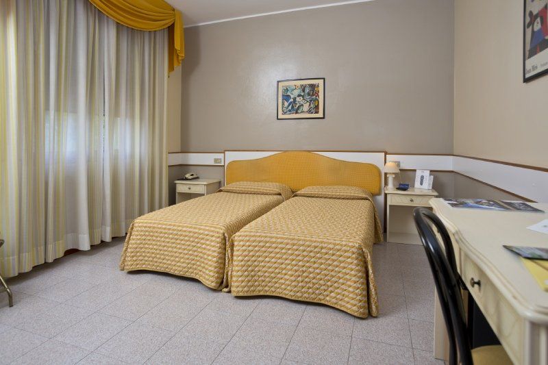 Camera doppia letti singoli