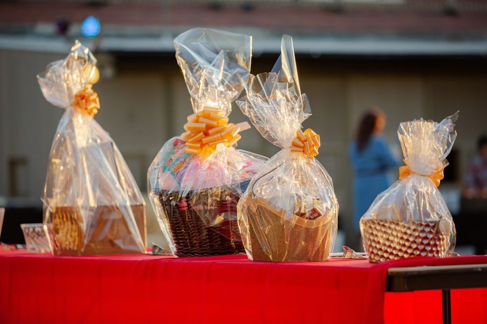 A group of baskets sitting on top of a red table.