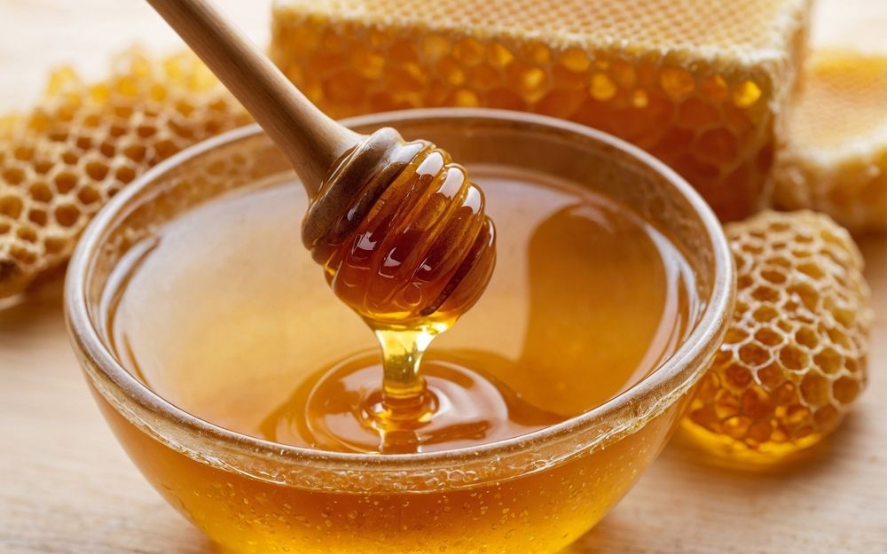 fresh honey in a bowl produced by Honey Helps