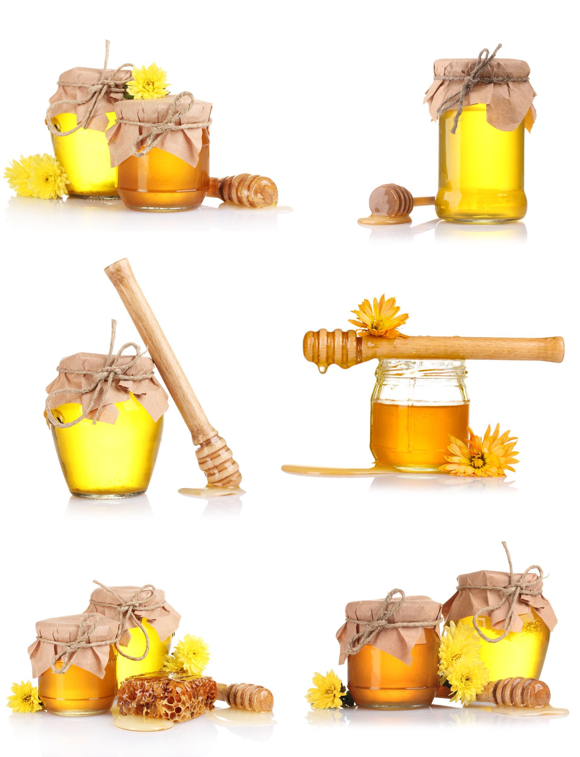 There are many different types of honey in the jars.