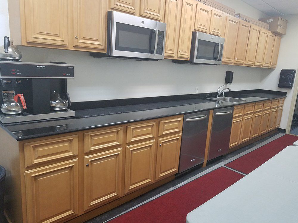 Kitchen with two microwave oven and coffee machine