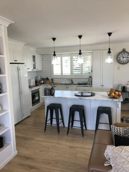 Black Stools Under an Island Bench — Innovative Design in Salamander Bay, NSW