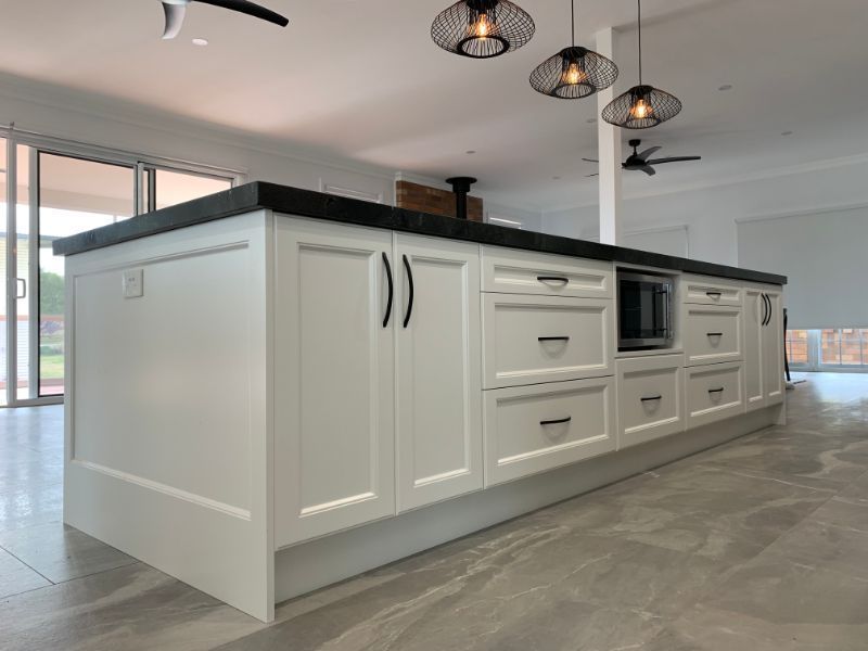 White Cabinets Installed in Island Bench — Innovative Design in Salamander Bay, NSW