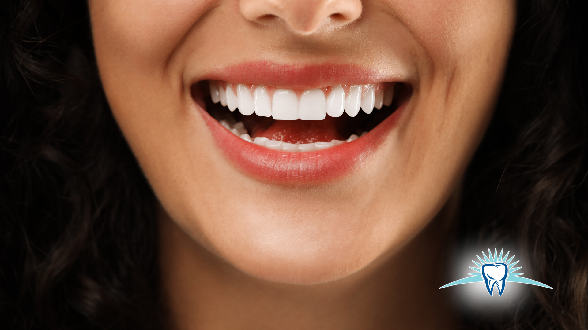 Smiling mouth with bright white teeth.