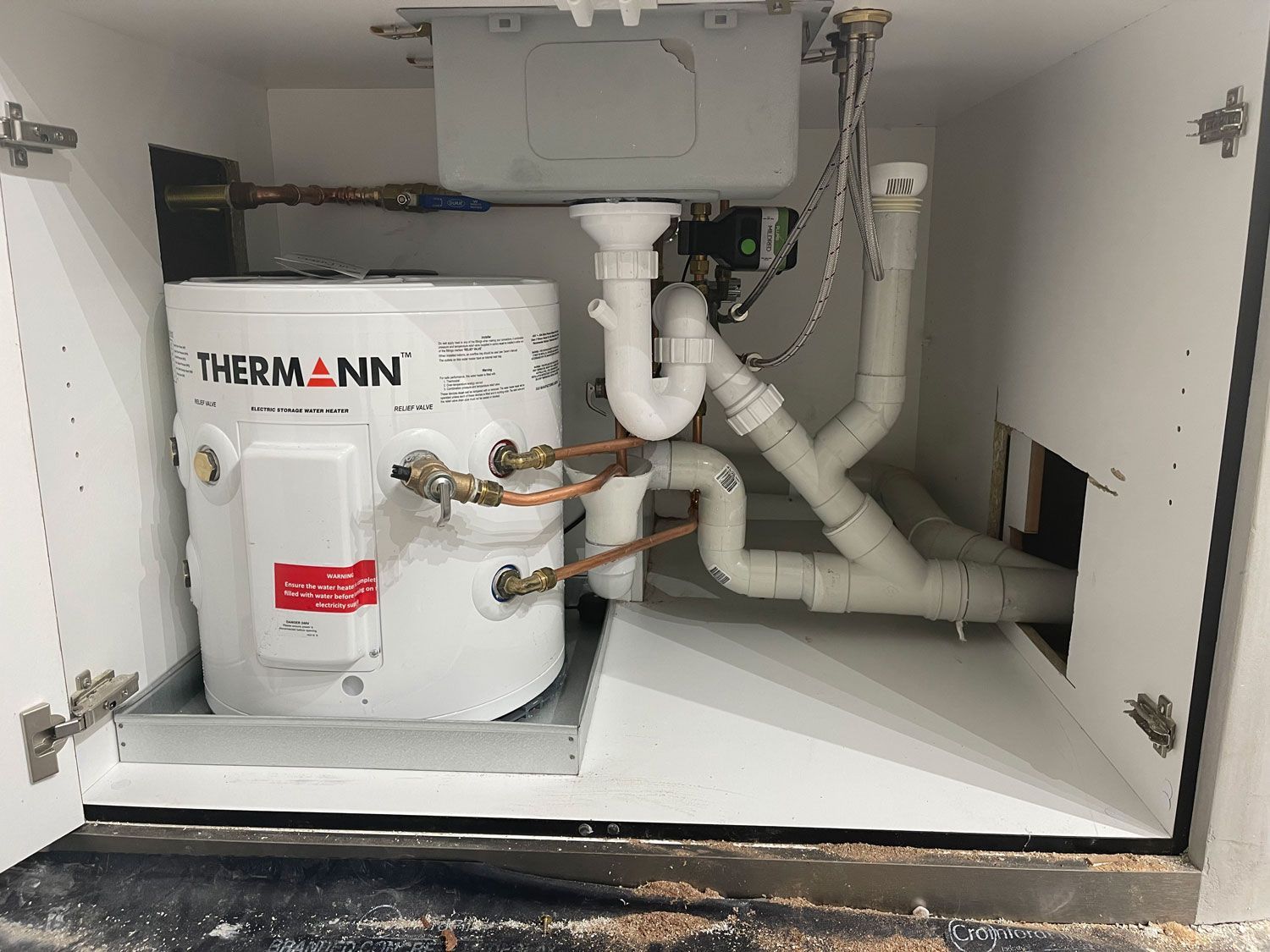 Water Heater Under The Sink Installed By A Plumber In Mudgeeraba
