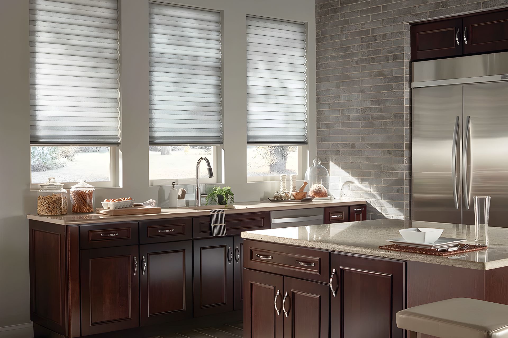 Kitchen with dark wood cabinets, stainless steel appliances, and cellular shades.