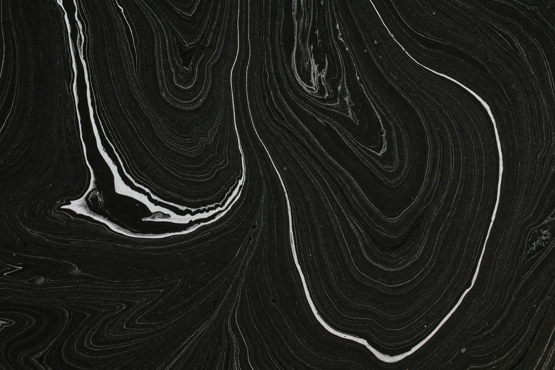 A close up of a black and white marble texture