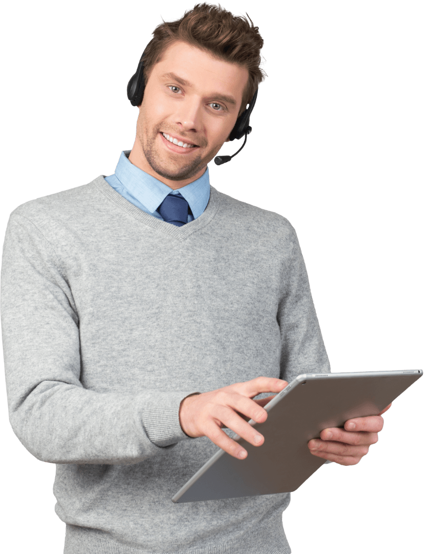 Man wearing a headset and holding a tablet, smiling.