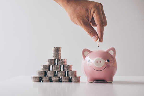 Savings going into a piggy bank