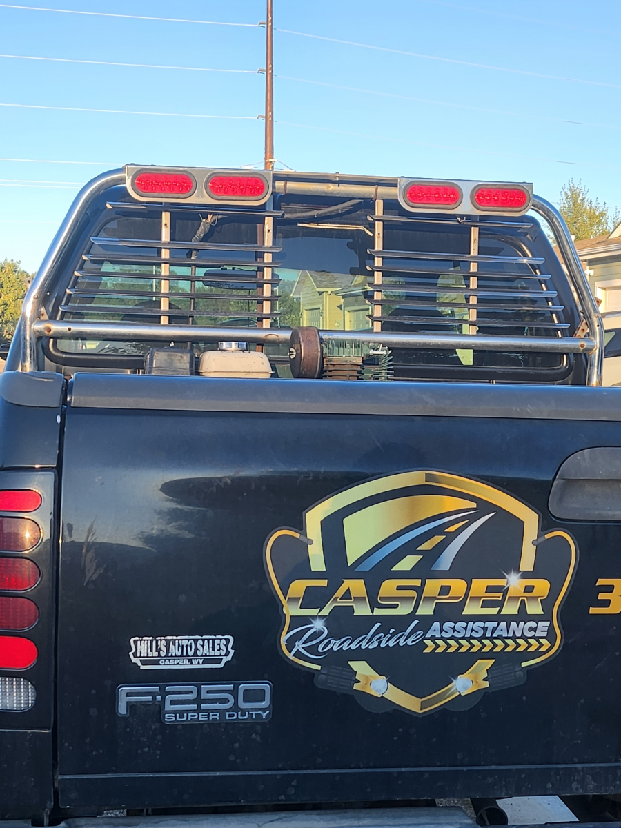 The back of a black truck with a casper 3 logo on it.