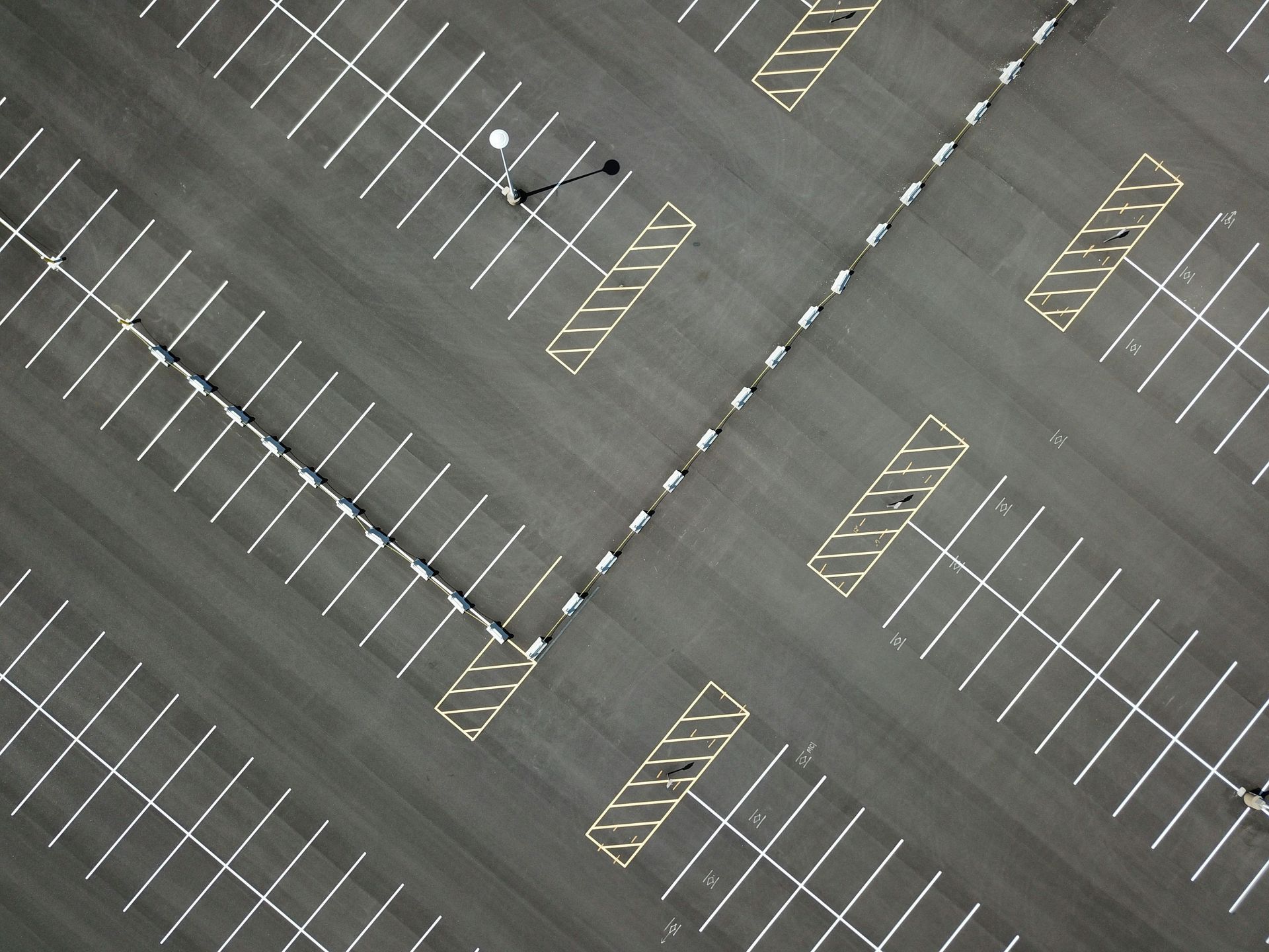 Freshly painted parking lot lines from above