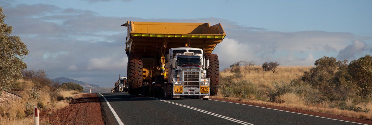 truck hauling oversize vehicle