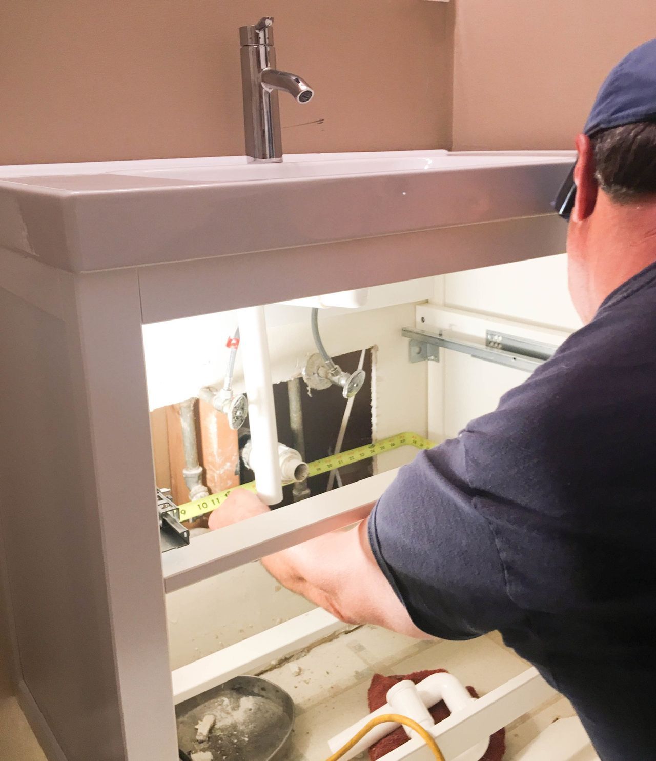 Installing New Bathroom Sink — Lexington, KY — Pro-Fetick Plumbing