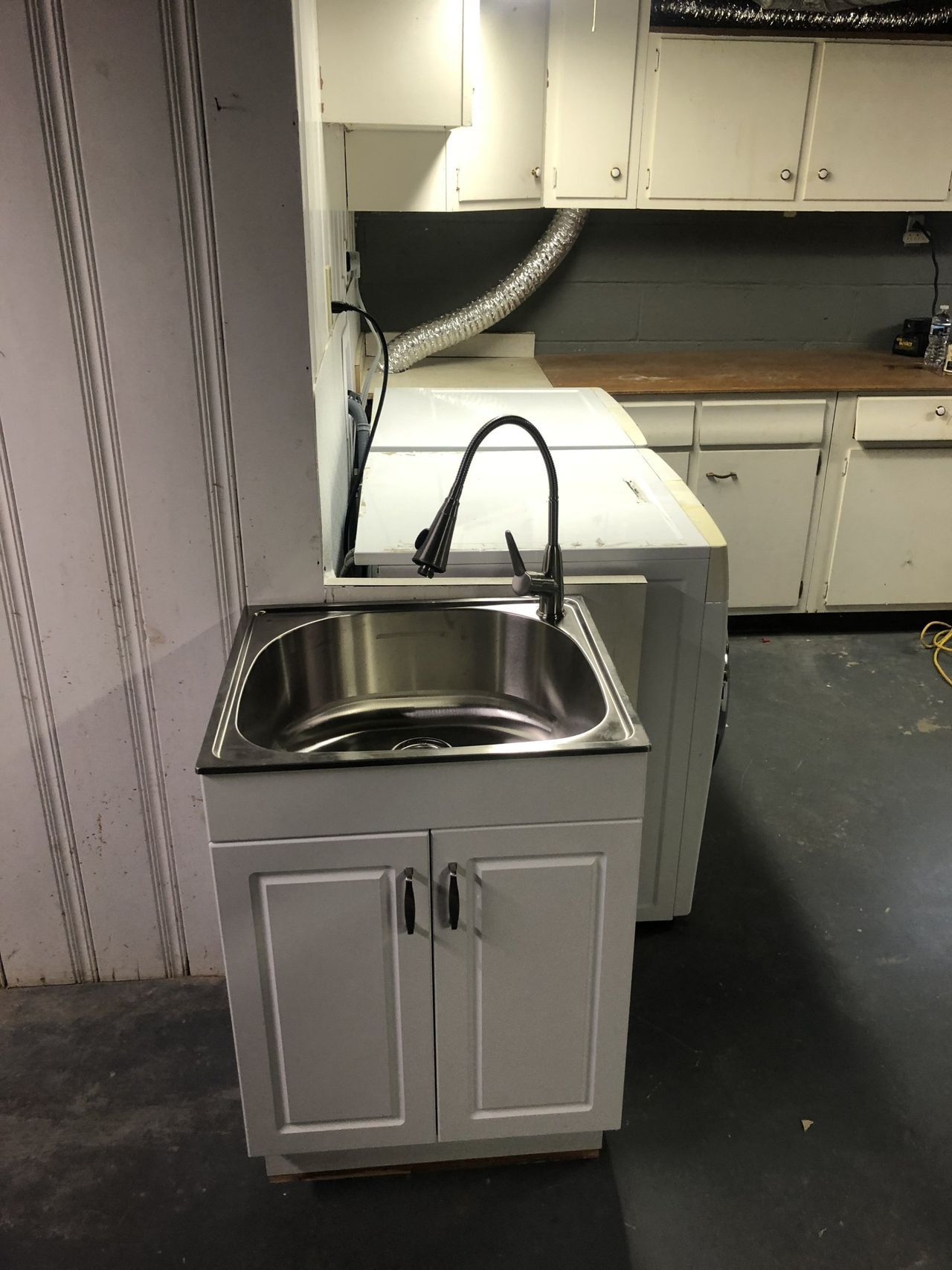Installing Kitchen Sink — Lexington, KY — Pro-Fetick Plumbing