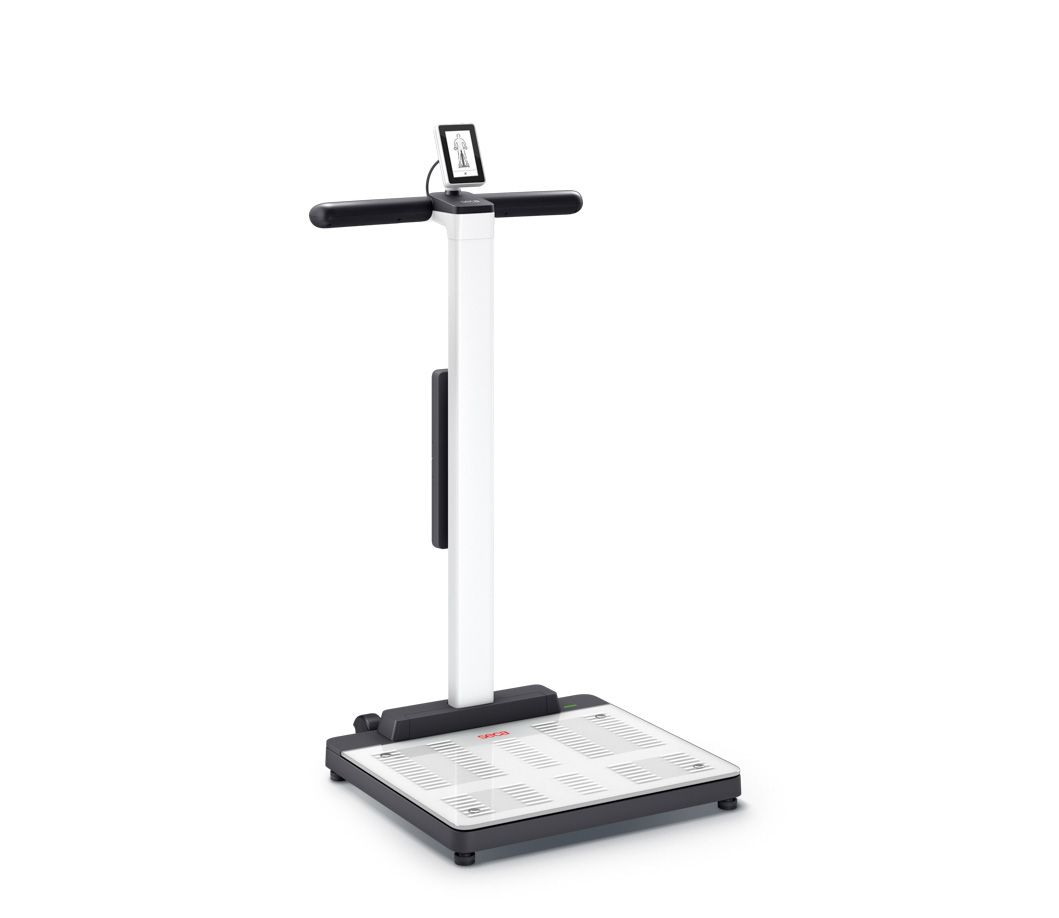 Black and silver body composition scale with handle and digital display on a white background