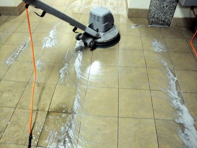 Electric mop cleaning a ceramic tiles - Carpet Cleaning in Colbert, WA