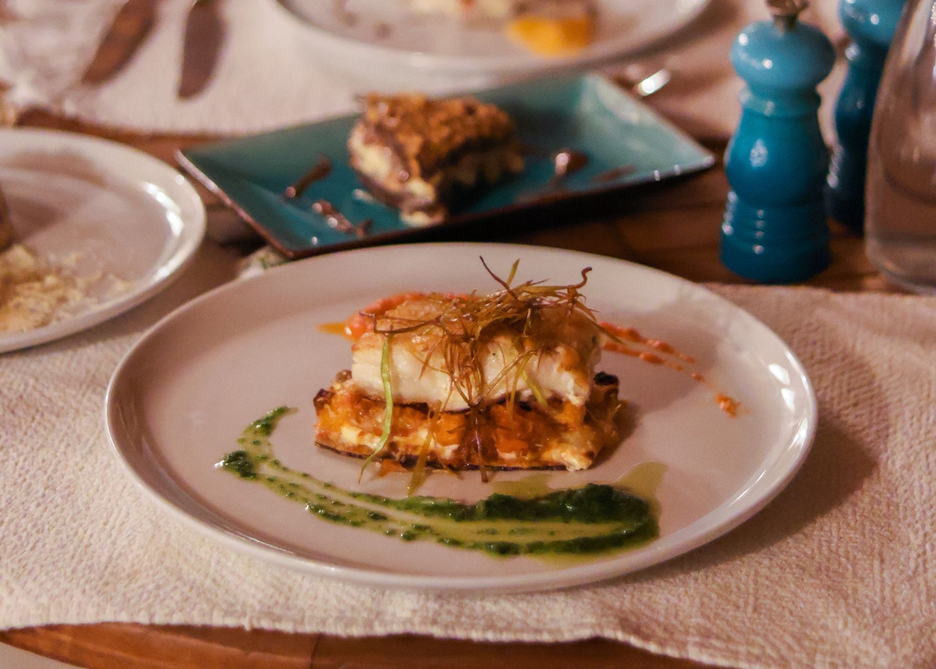 A close up of a plate of food on a table.