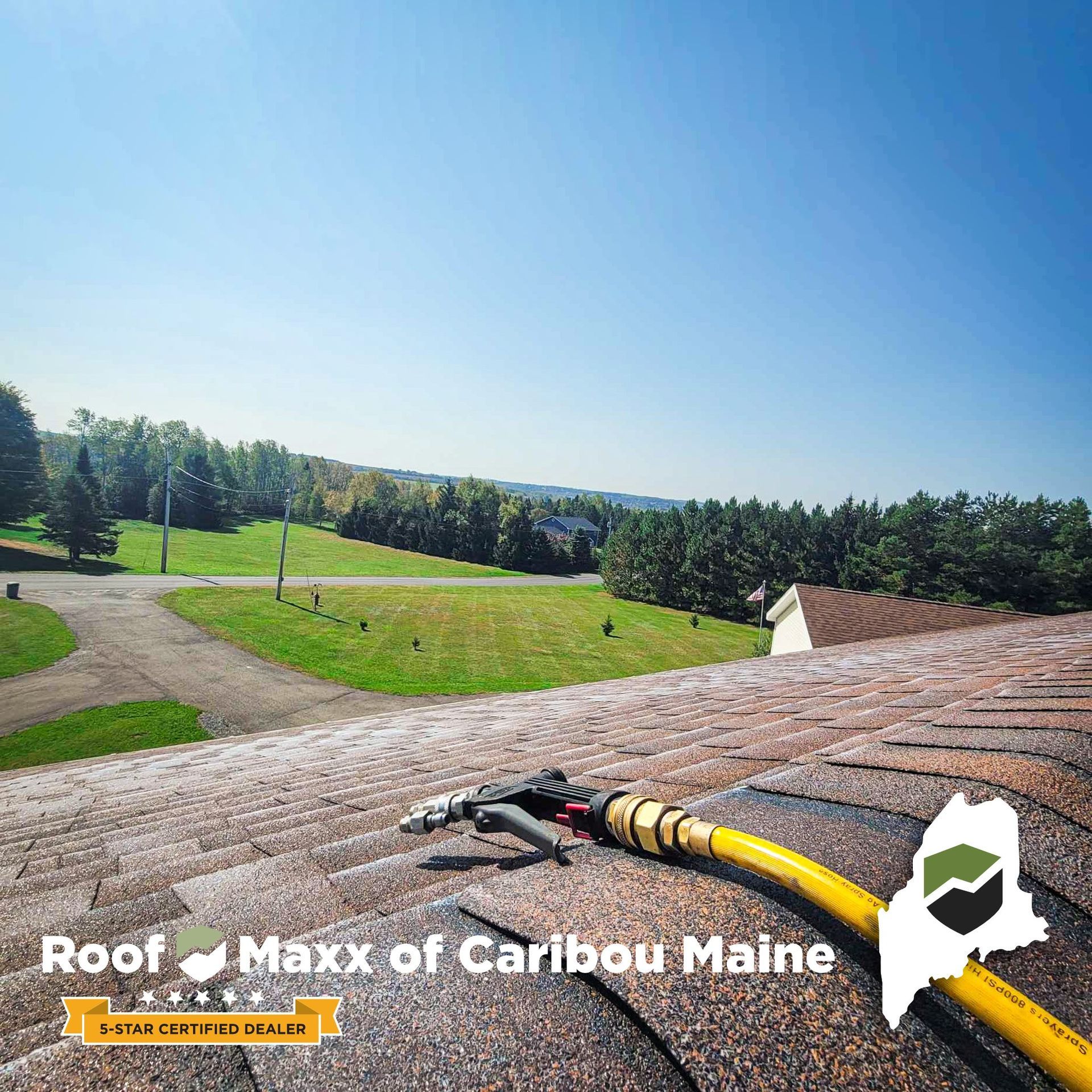 A hose is laying on top of a roof in maine.